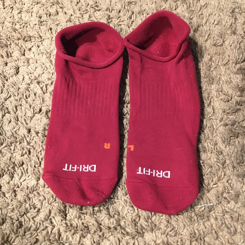 Fun pair of no show style Nike socks size large